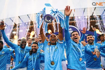 Manchester City lifting the Premier League in the 2020-2021 season in their home stadium
