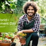 A young happy man holding a plant