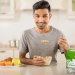 A young man eating healthy food with Fibre Fit
