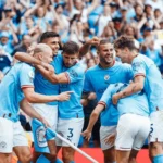 Man city players celebrating victory