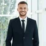 A successful direct seller looking at the camera