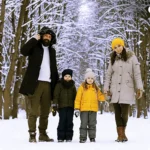 A family standing in snow