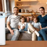 A-family-sitting-on-a-sofa-in-the-living-room