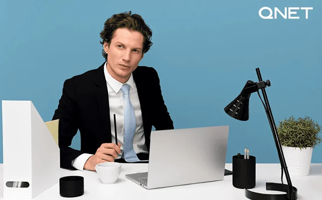 A sharply dressed man contemplating | Importance of goal setting