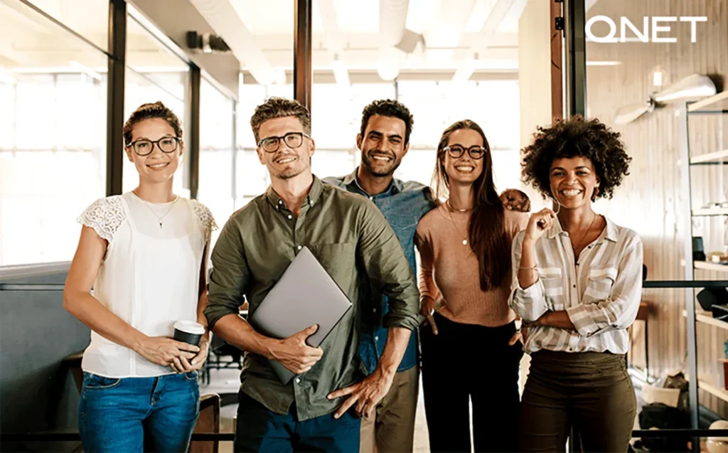 A group of optimistic entrepreneurs looking straight optimistically | QNET India