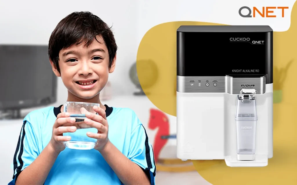 A kid drinking pure water featuring KNIGHT Alkaline RO