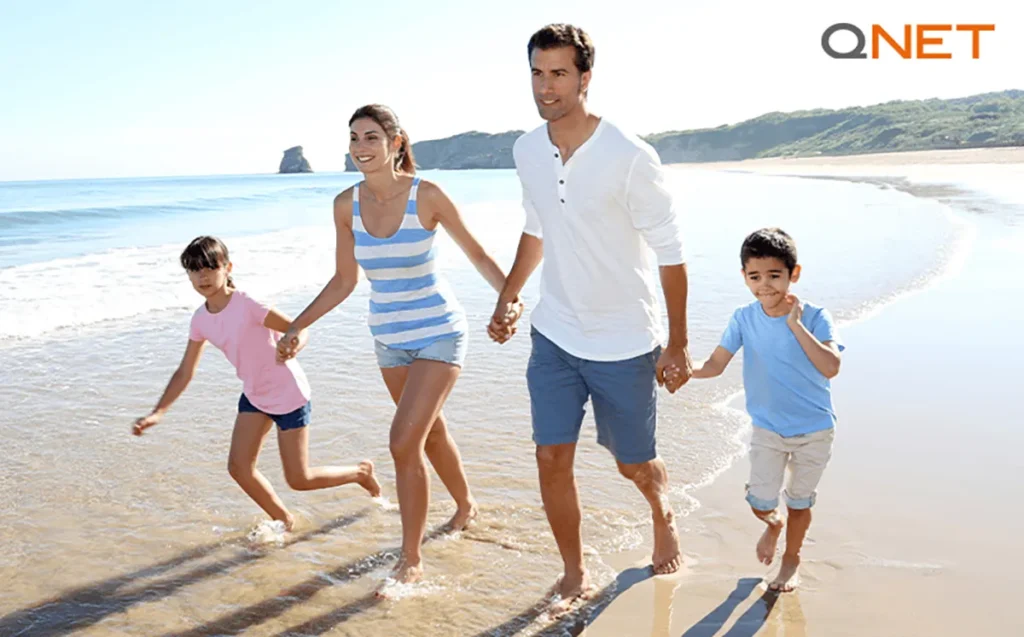 A family on vacation at a beach