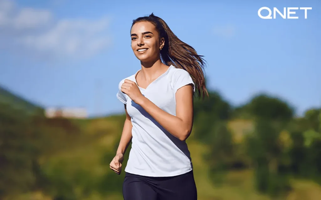 Woman running in park
