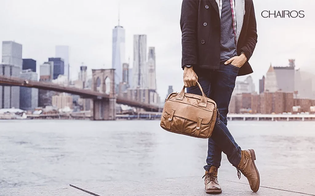 A handsome young man wearing a fashionable outfit in the city