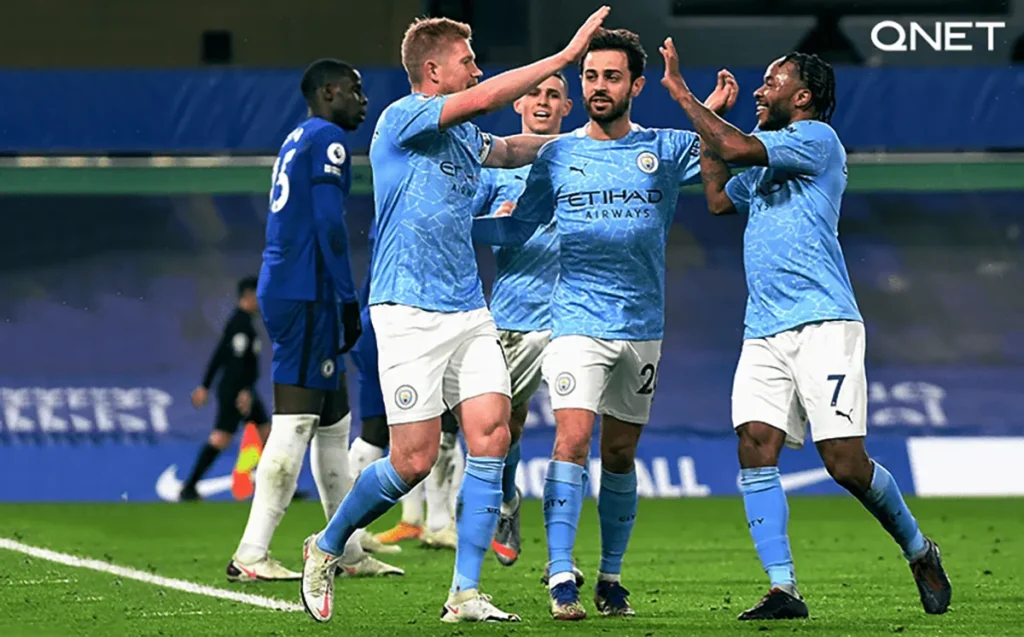 Manchester City players scoring a goal against Chelsea in the Premier League