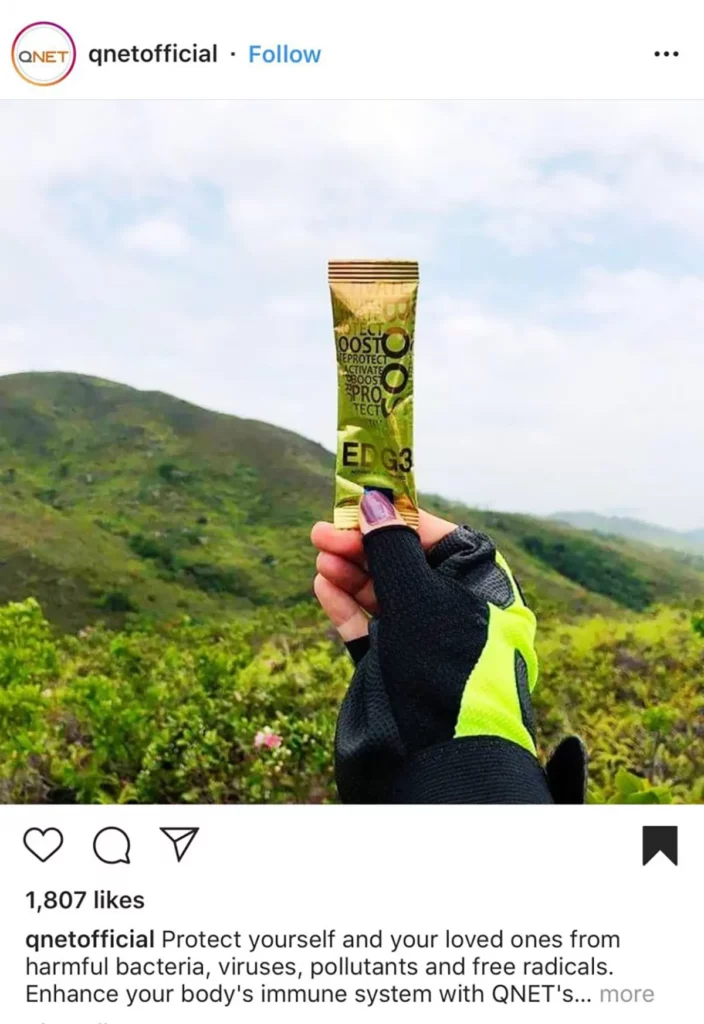 World Photography Day: A hand holding a sachet of EDG3 against the natural background