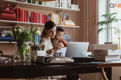 QNET India Mompreneur working along with her child