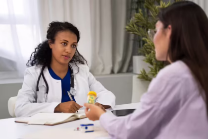 Doctor's Day 2026: Doctor consulting a patient and providing expert medical advice during a routine health check-up